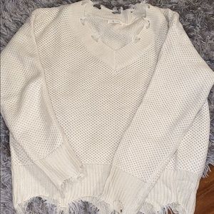Distresses sweater